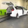White Chrysler Voyager with BraunAbility Rear Entry Manual Fold Out conversion