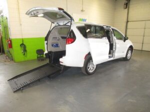 White Chrysler Voyager with BraunAbility Rear Entry Manual Fold Out conversion