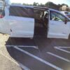 White Chrysler Pacifica with Driverge Side Entry Automatic Fold Out conversion