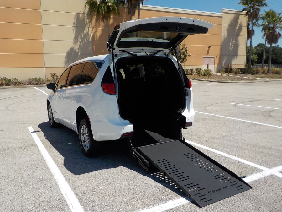 White Chrysler Voyager with BraunAbility Rear Entry Manual Fold Out conversion