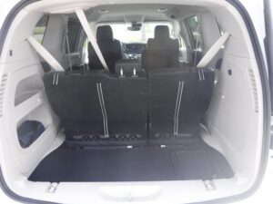 White Chrysler Pacifica with BraunAbility Side Entry Automatic In Floor conversion