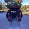 Red Chrysler Pacifica with Driverge Rear Entry Manual Fold Out conversion