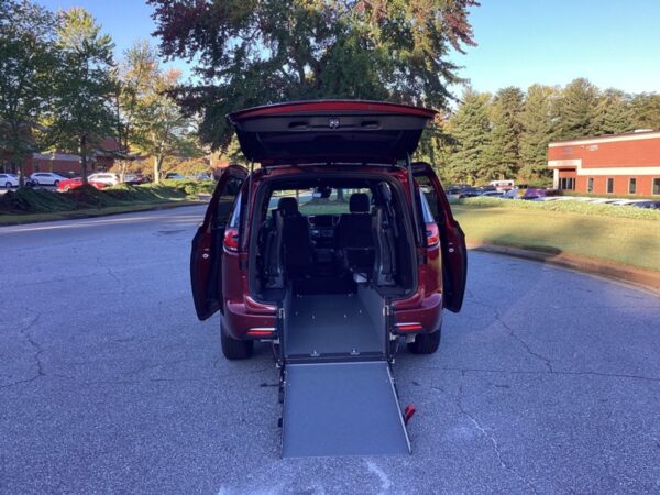 Red Chrysler Pacifica with Driverge Rear Entry Manual Fold Out conversion