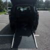 Blue Toyota Sienna with Driverge Rear Entry Manual Fold Out conversion