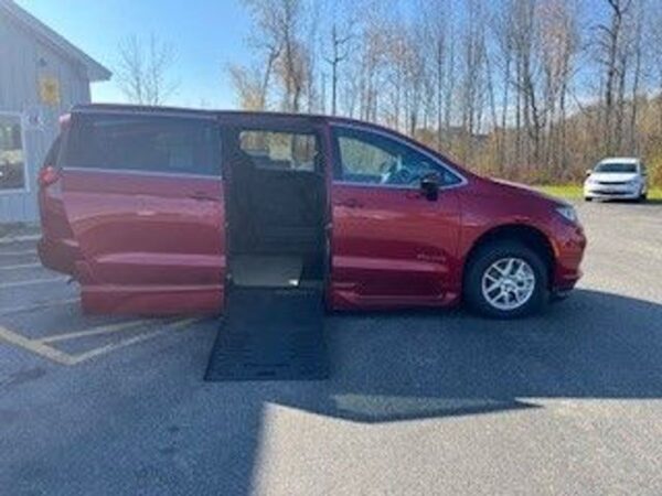 Red Chrysler Pacifica with BraunAbility Side Entry Automatic Fold Out conversion