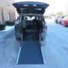 Black Toyota Sienna with Driverge Rear Entry Manual Fold Out conversion