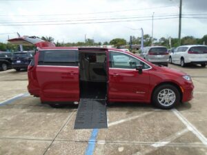 Red Chrysler Pacifica with Driverge Side Entry Automatic Fold Out conversion