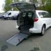 White Chrysler Voyager with Driverge Rear Entry Manual Fold Out conversion