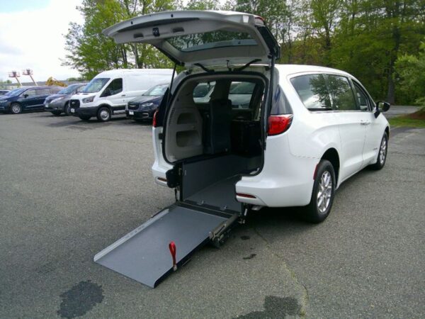 White Chrysler Voyager with Driverge Rear Entry Manual Fold Out conversion