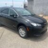 Black Chrysler Voyager with BraunAbility Rear Entry Manual Fold Out conversion