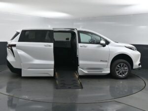 White Toyota Sienna with BraunAbility Side Entry Automatic Fold Out conversion
