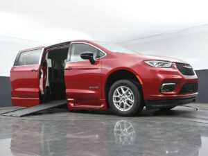 Red Chrysler Pacifica with BraunAbility Side Entry Automatic In Floor conversion