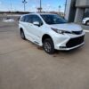 White Toyota Sienna with BraunAbility Side Entry Automatic Fold Out conversion