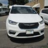 White Chrysler Pacifica with BraunAbility Side Entry Automatic Fold Out conversion