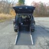 Black Toyota Sienna with Driverge Rear Entry Manual Fold Out conversion