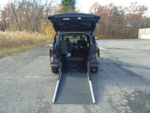 Black Toyota Sienna with Driverge Rear Entry Manual Fold Out conversion