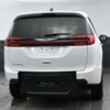 White Chrysler Pacifica with BraunAbility Rear Entry Manual Fold Out conversion