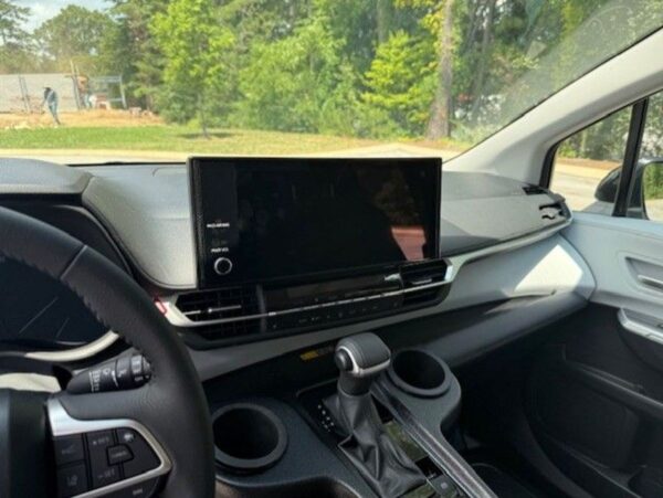 Blue Toyota Sienna with BraunAbility Side Entry Automatic Fold Out conversion