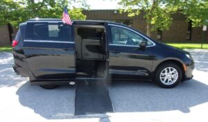 Black Chrysler Voyager with Driverge Side Entry Automatic Fold Out conversion