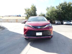 Red Toyota Sienna with BraunAbility Side Entry Automatic Fold Out conversion