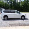 White Chrysler Voyager with BraunAbility Rear Entry Manual Fold Out conversion