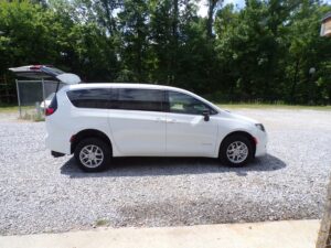 White Chrysler Voyager with BraunAbility Rear Entry Manual Fold Out conversion