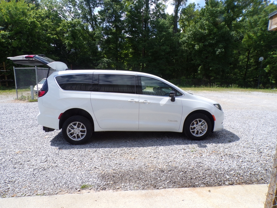 White Chrysler Voyager with BraunAbility Rear Entry Manual Fold Out conversion