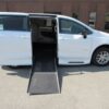 White Chrysler Voyager with Driverge Side Entry Automatic Fold Out conversion