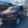 Red Chrysler Pacifica with Driverge Side Entry Automatic Fold Out conversion