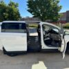 White Chrysler Voyager with BraunAbility Side Entry Manual Fold Out conversion