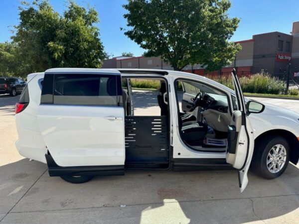 White Chrysler Voyager with BraunAbility Side Entry Manual Fold Out conversion