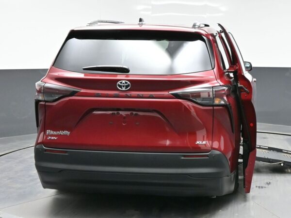 Red Toyota Sienna with BraunAbility Side Entry Automatic Fold Out conversion