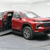 Red Chevrolet Traverse with BraunAbility Side Entry Automatic In Floor conversion