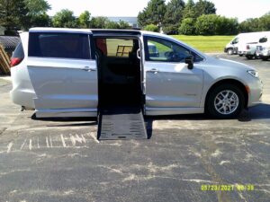 Silver Chrysler Pacifica with BraunAbility Side Entry Automatic Fold Out conversion