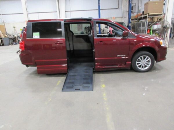 Red Dodge Grand Caravan with BraunAbility Side Entry Automatic Fold Out conversion