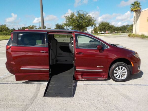 Red Chrysler Pacifica with BraunAbility Side Entry Automatic Fold Out conversion