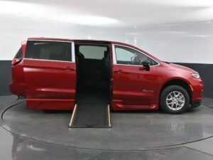 Red Chrysler Pacifica with BraunAbility Side Entry Automatic In Floor conversion
