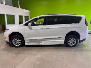 White Chrysler Pacifica with BraunAbility Side Entry Automatic Fold Out conversion