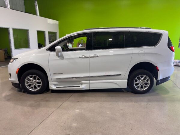 White Chrysler Pacifica with BraunAbility Side Entry Automatic Fold Out conversion