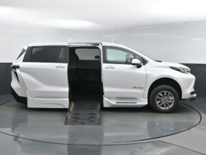 White Toyota Sienna with BraunAbility Side Entry Automatic Fold Out conversion