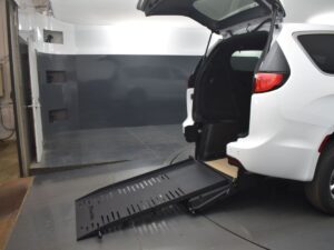 White Chrysler Voyager with BraunAbility Rear Entry Manual Fold Out conversion