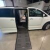 White Toyota Sienna with BraunAbility Side Entry Automatic Fold Out conversion