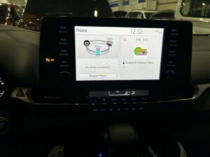 White Toyota Sienna with BraunAbility Side Entry Automatic Fold Out conversion