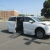 White Toyota Sienna with BraunAbility Side Entry Automatic Fold Out conversion