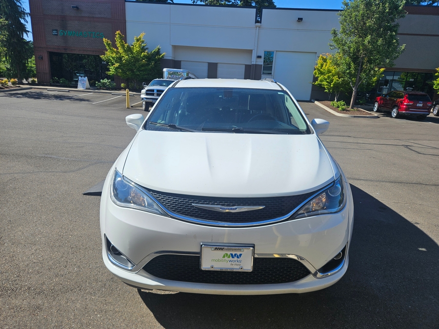 White Chrysler Pacifica with Vantage Mobility Side Entry Automatic In Floor conversion