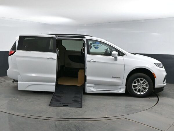 White Chrysler Pacifica with BraunAbility Side Entry Automatic Fold Out conversion
