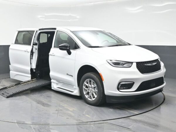 White Chrysler Pacifica with BraunAbility Side Entry Automatic Fold Out conversion