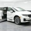 White Honda Odyssey with BraunAbility Side Entry Automatic In Floor conversion