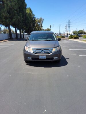 Brown Honda Odyssey with BraunAbility Side Entry Automatic Fold Out conversion
