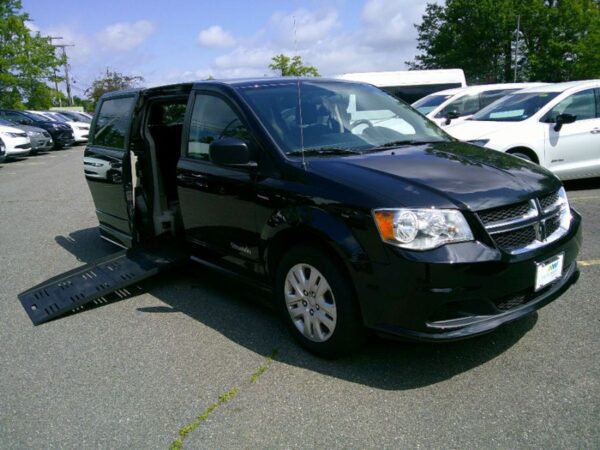 Black Dodge Grand Caravan with BraunAbility Side Entry Automatic Fold Out conversion